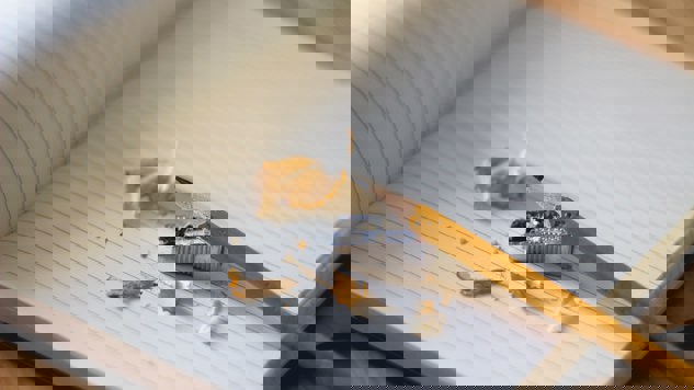 A sharpened pencil on a note book. Picture: Unsplash.