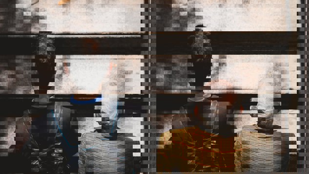 A young man and an older man walk together up the stairs. Picture: Unsplash.