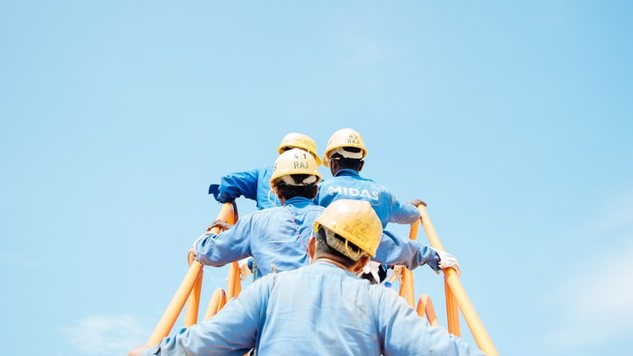 A group of workers on a stair. Picture: Unsplash.
