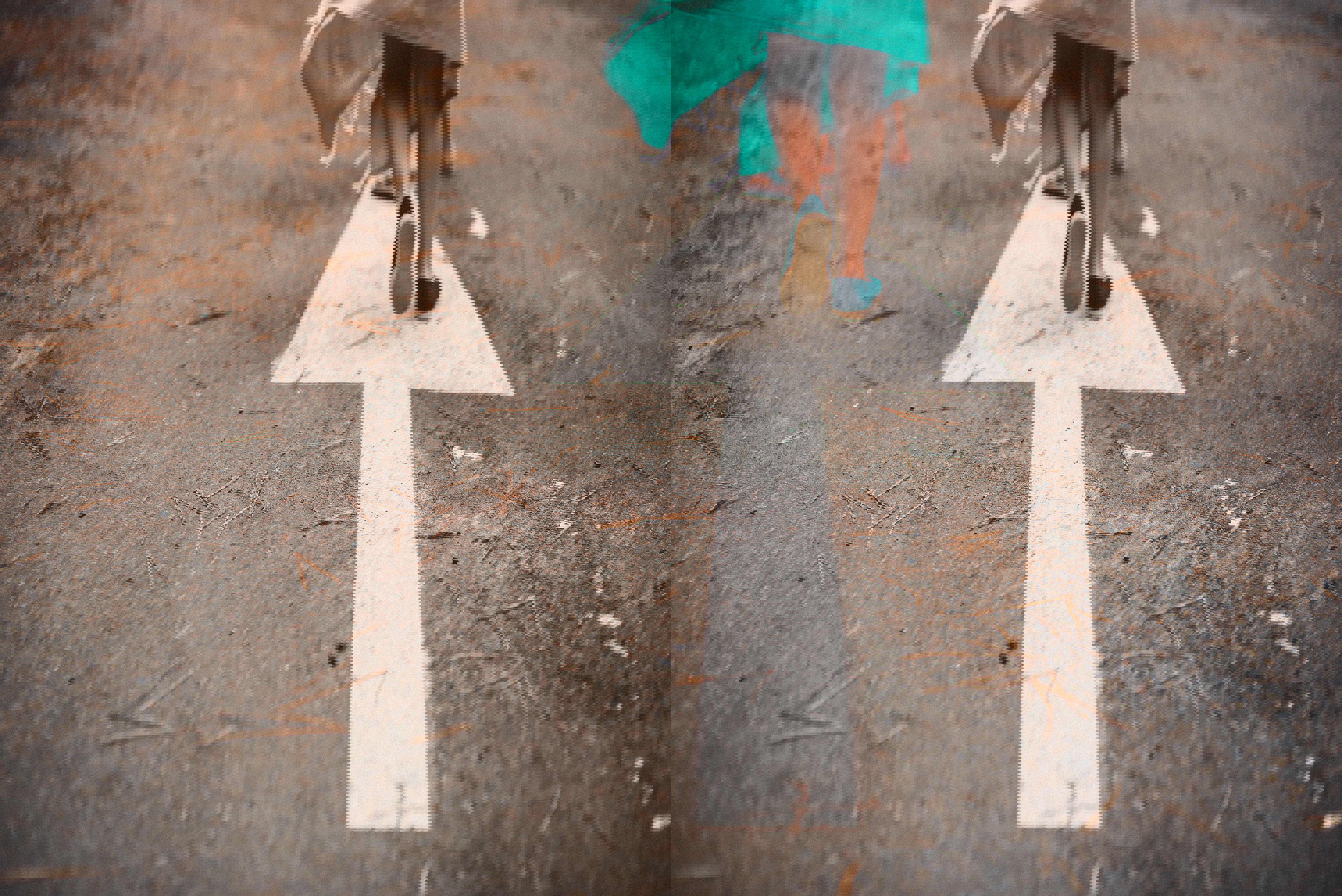 Person walking on arrow street. Picture: Unsplash.