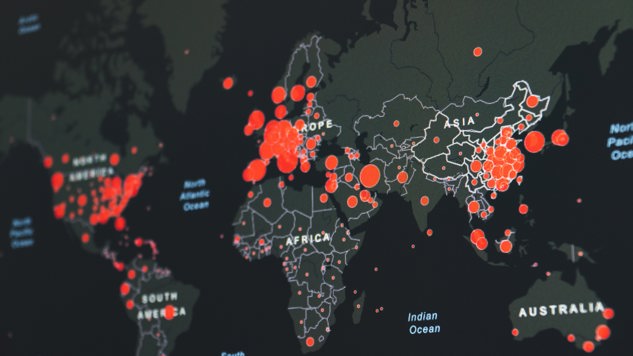 röda prickar av olika storlek på en svart och grå världskarta