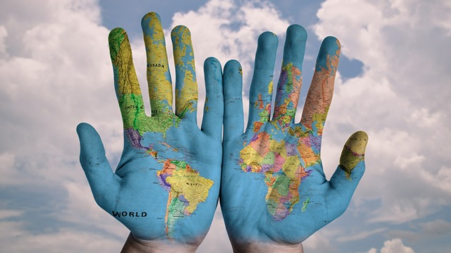Two hands painted of the world map. Picture: Pixabay.