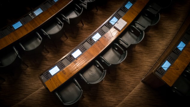 Empty chairs in a parliament. Picture: Unsplash.