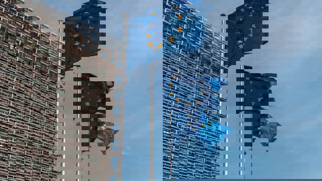 Three flags outside of the European parliament. Picture: Unsplash.